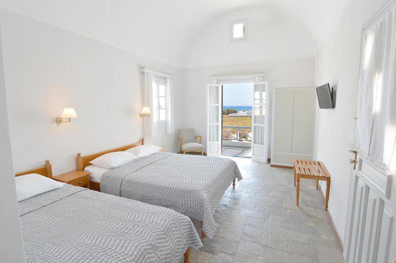 Nostos Studios Playa de Perivolos Habitación foto